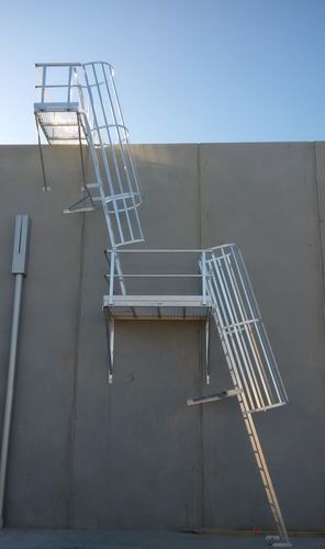 Angled Cage Ladder with change of direction Platform